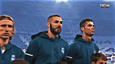 Soccer Players In Front Of Screen GIF