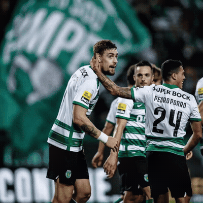 Soccer Players In Green And White Betano Jerseys GIF