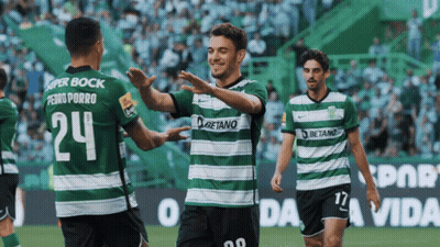 Soccer Players In Green And White Striped Betano Jerseys GIF