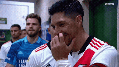 Soccer Players In Locker Room One Holding Nose GIF