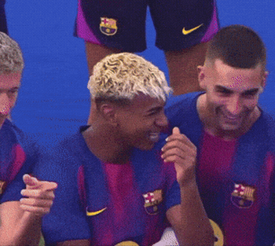 Soccer Players In Nike Jerseys Laughing And Pointing GIF