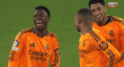 Soccer Players In Orange Jerseys Emirates Fly Better GIF