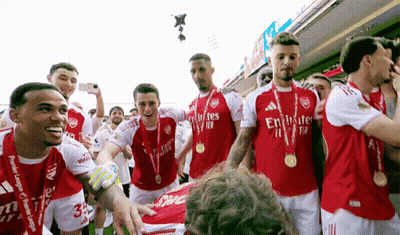 Soccer Players In Red And White Emirates Jerseys GIF