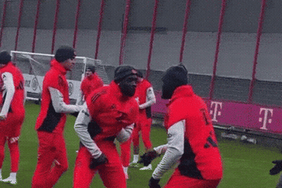 Soccer Players in Red Shirts With T