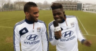 Soccer Players In White Hyundai Jerseys Talking GIF