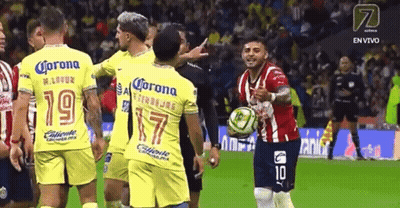 Soccer Players In Yellow Jerseys With Corona GIF