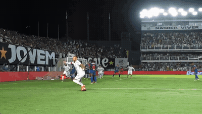 Soccer Players On A Field With A Banner That Says Jovem On It GIF