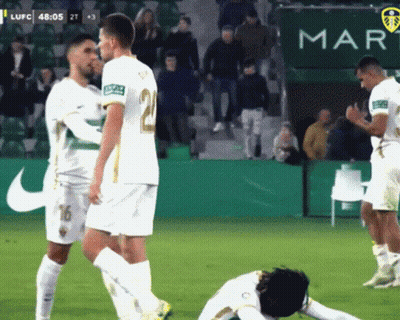 Soccer Players On A Field With A Banner That Says Map GIF