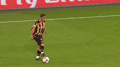 Soccer Players On A Field With A Fly Emirates Banner GIF