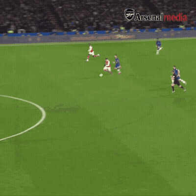 Soccer Players On A Field With Arsenal Media Written On The Bottom Right GIF