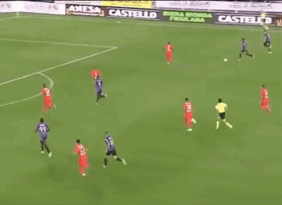 Soccer Players On A Field With Banners For Castello GIF