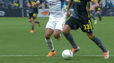 Soccer Players On A Field With One Wearing A Jersey That Says Euro Volley GIF