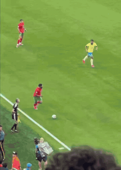 Soccer Players On A Field With One Wearing A Red Jersey With The Number 11 On It GIF