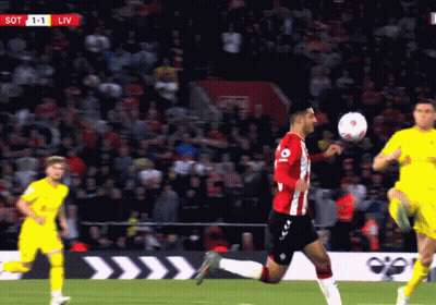 Soccer Players On A Field With The Score Of 1-0 GIF