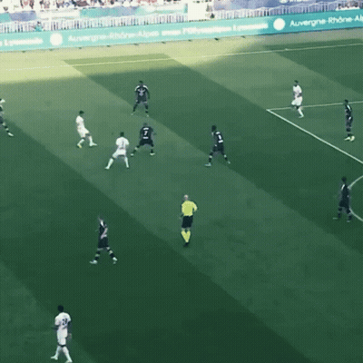 Soccer Players On Field With Banner GIF