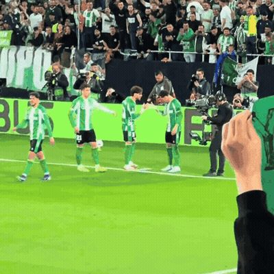 Soccer Players On Field With Banner Saying Jfu GIF