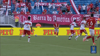 Soccer Players On Field With Barra Do America Banner GIF