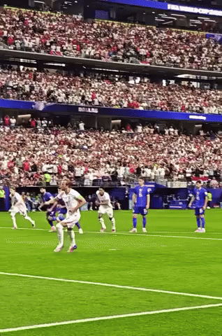 Soccer Players On Field With Crowd GIF