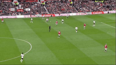 Soccer Players On Field With Dubai Sign GIF