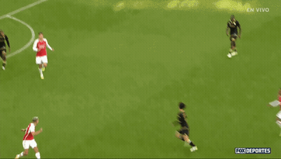 Soccer Players On Field With En Vivo GIF
