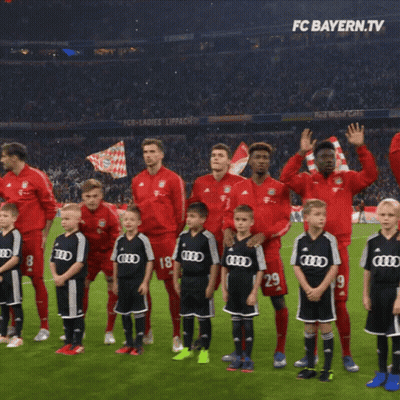 Soccer Players On Field With FC Bayern.tv Logo GIF