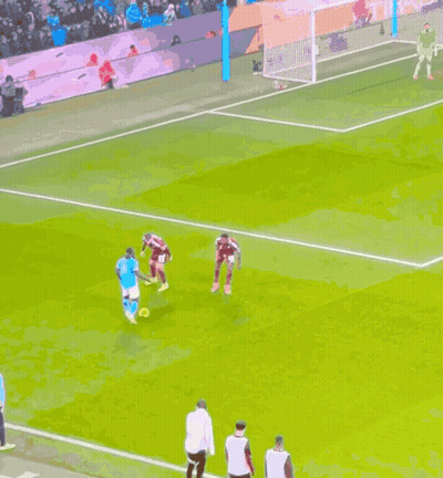 Soccer Players On Field With Goalkeeper GIF