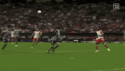 Soccer Players On Field With Heineken Ad GIF