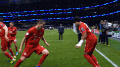 Soccer Players On Field With Heineken Shirt GIF