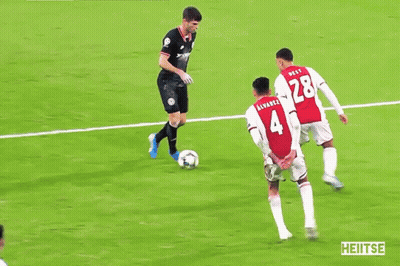 Soccer Players On Field With Lays Ad GIF