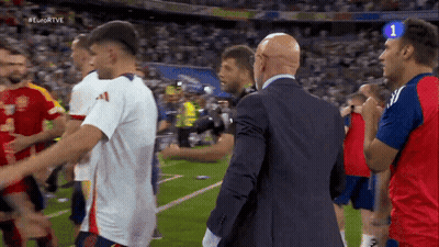 Soccer Players On Field With Number 1 GIF