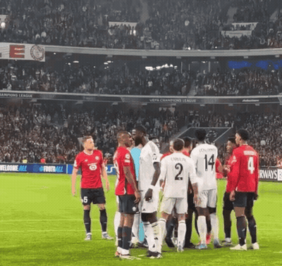 Soccer Players On Field With Number 2 GIF