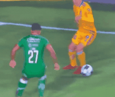 Soccer Players On Field With Number 9 Mascot GIF