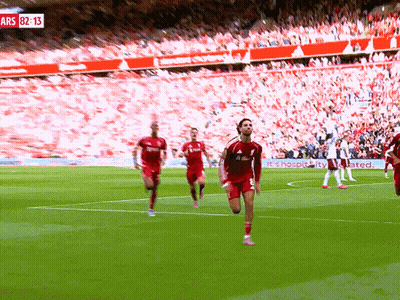 Soccer Players On Field With Sign Ars 82:13 GIF