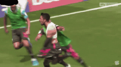 Soccer Players On Field With Sky Sports Logo GIF