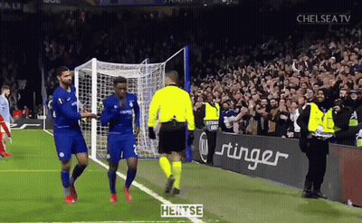 Soccer Players On Field With Stinger Ad GIF