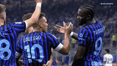 Soccer Players On Field With T & T Sign GIF