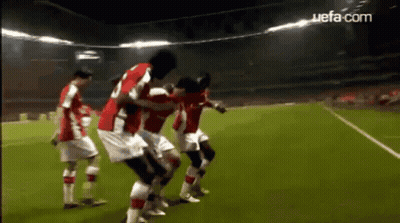 Soccer Players On Field With UEFA.com GIF