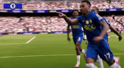 Soccer Players Palmer And Rogers Hugging In Front Of Crowd GIF