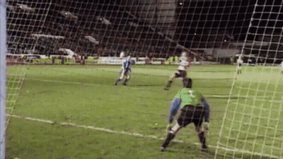 Soccer Players Playing At Night GIF