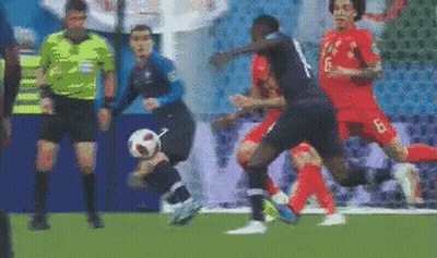Soccer Players Playing With Referee GIF