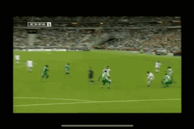Soccer Players Playing With TCM Scoreboard GIF