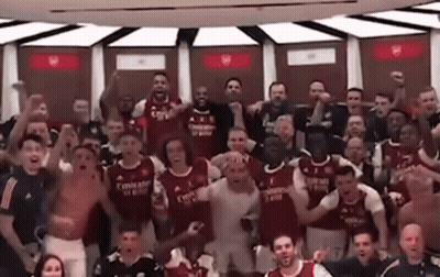 Soccer Players Posing In Dressing Room GIF