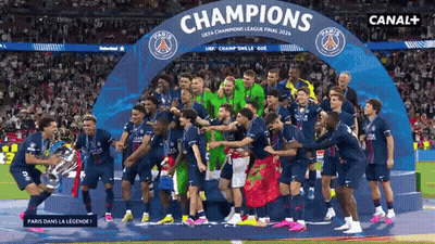 Soccer Players Posing Under Champions Banner GIF
