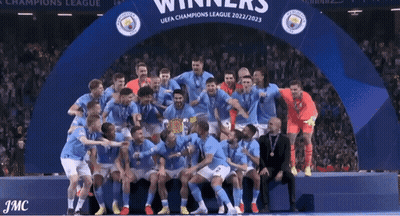 Soccer Players Posing With Champions League Trophy GIF