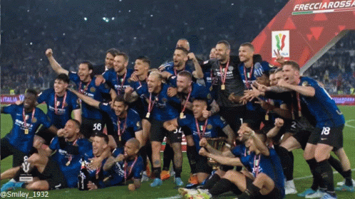 Soccer Players Posing With Frecciarossa Sign GIF