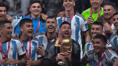 Soccer Players Posing With Trophy And Medals GIF