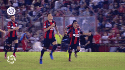 Soccer Players Running Banco Central Shirt GIF