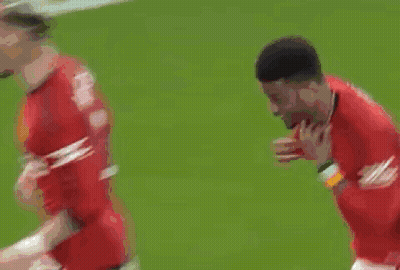 Soccer Players Running On Field With Crowd GIF