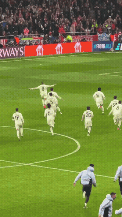 Soccer Players Running With Airways Banner GIF