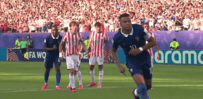 Soccer Players Running With Aramc Banner GIF